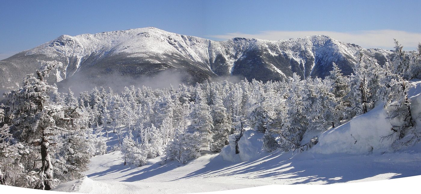 Rime-covered trees and the snow-covered Franconia Ridge seen from Cannon Mountain, New Hampshire
