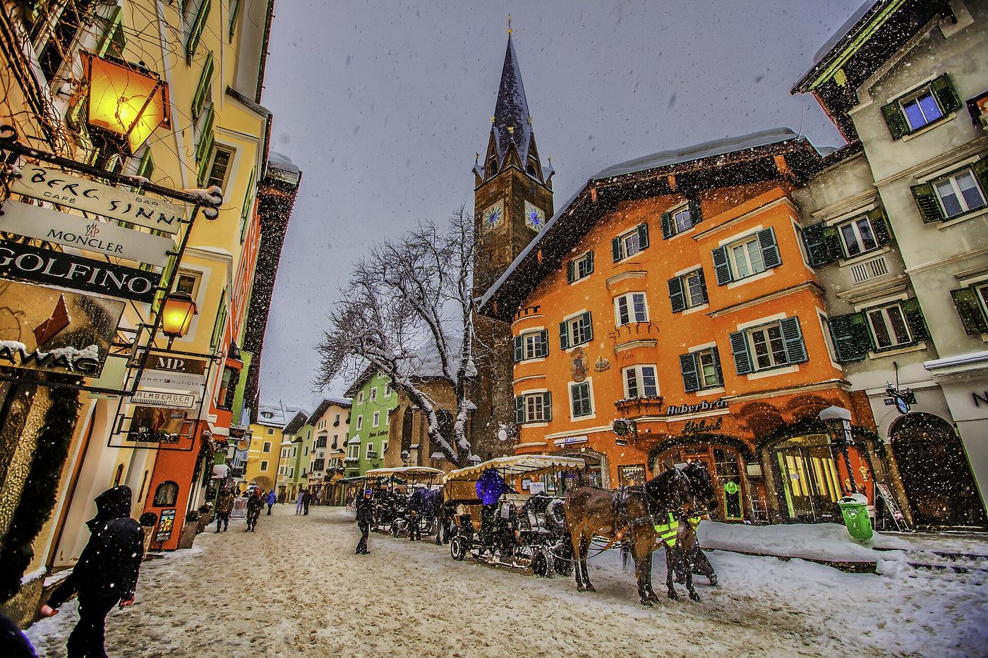 The snow-covered old town of Kitzbühel, Austria, during a snowfall