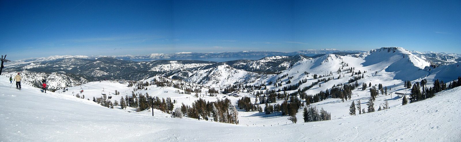 Panoramic view over Palisades Tahoe with Lake Tahoe in the distance, California