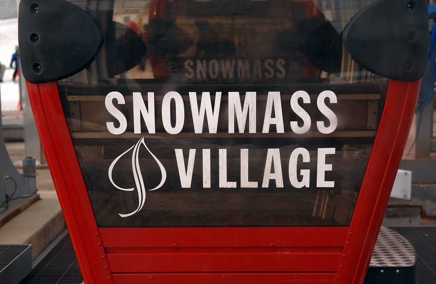 A gondola cabin marked Snowmass Village at the base of the Snowmass ski area, Colorado