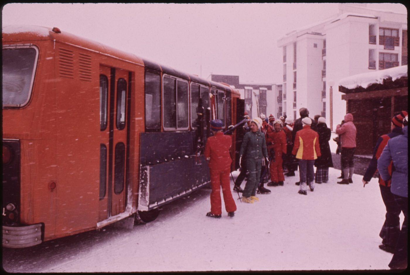 Skiers loading onto the free shuttle bus between Lionshead and Vail Village, Colorado